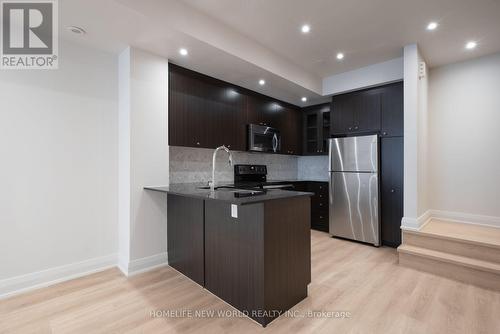 17 - 135 Long Branch Avenue, Toronto, ON - Indoor Photo Showing Kitchen
