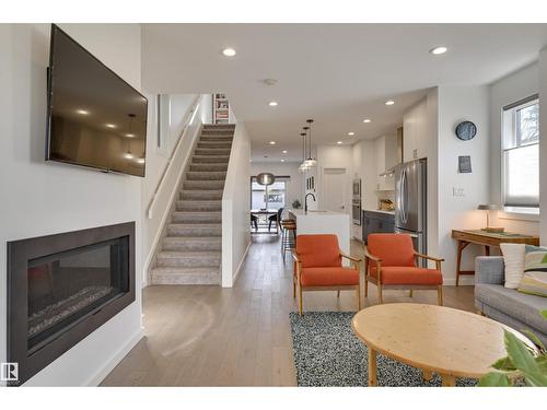 10411 144 St Nw, Edmonton, AB - Indoor Photo Showing Living Room With Fireplace