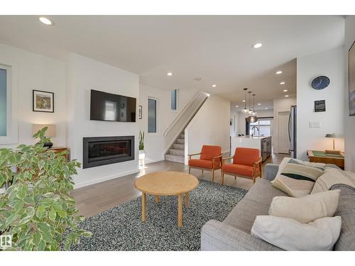 10411 144 St Nw, Edmonton, AB - Indoor Photo Showing Living Room With Fireplace