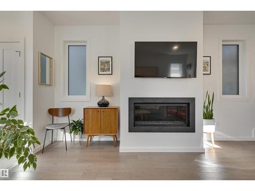 10411 144 St Nw, Edmonton, AB - Indoor Photo Showing Living Room With Fireplace