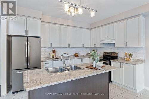 55 Buttonshaw Street, Clarington, ON - Indoor Photo Showing Kitchen With Double Sink With Upgraded Kitchen