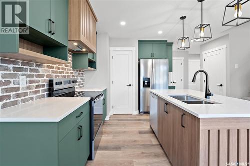 3044 Dumont Way, Regina, SK - Indoor Photo Showing Kitchen With Double Sink With Upgraded Kitchen