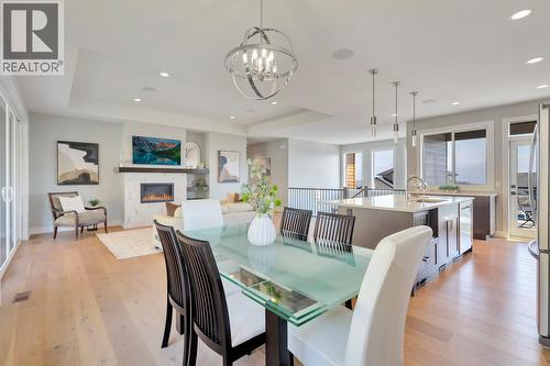 2594 Crown Crest Drive, West Kelowna, BC - Indoor Photo Showing Dining Room With Fireplace