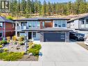 Backing onto green space with trees amongst your property line - 2594 Crown Crest Drive, West Kelowna, BC  - Outdoor With Facade 