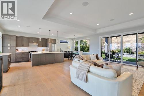 Large sliding doors for convenient yard access - 2594 Crown Crest Drive, West Kelowna, BC - Indoor Photo Showing Kitchen With Upgraded Kitchen