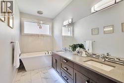 Double sink vanity with a large stand up shower & soaker tub - 