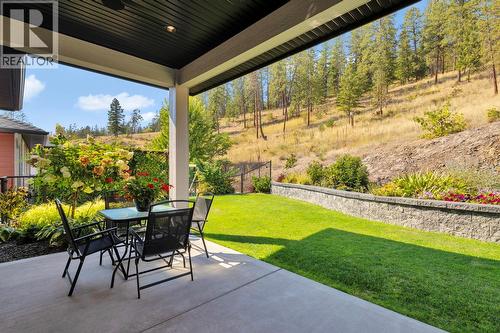 Perfect yard for your furry friends to enjoy - 2594 Crown Crest Drive, West Kelowna, BC - Outdoor With Deck Patio Veranda With Exterior