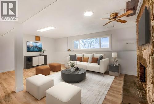 Virtually staged photo for Rec Room - 10010 Kel Win Road, Lake Country, BC - Indoor Photo Showing Living Room