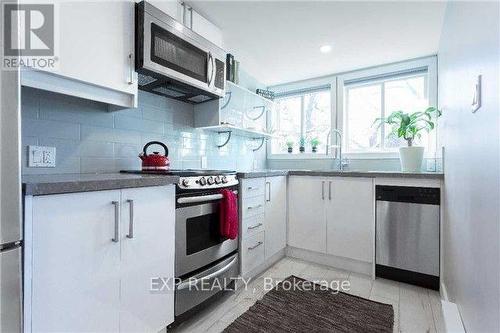 Upper - 122 Parkmount Road, Toronto, ON - Indoor Photo Showing Kitchen With Upgraded Kitchen