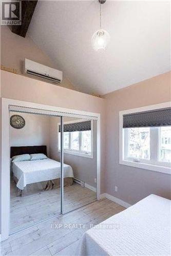 Upper - 122 Parkmount Road, Toronto, ON - Indoor Photo Showing Bedroom