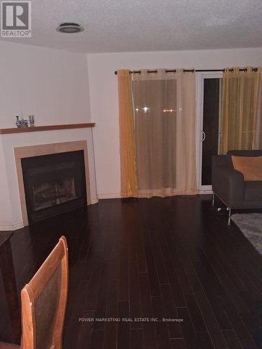 455 Valade Crescent, Ottawa, ON - Indoor Photo Showing Living Room With Fireplace