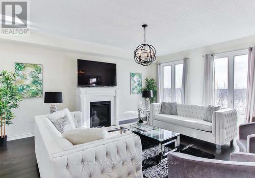 215 Northglen Boulevard, Clarington (Bowmanville), ON - Indoor Photo Showing Living Room With Fireplace