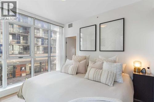 303, 550 Riverfront Avenue Se, Calgary, AB - Indoor Photo Showing Bedroom