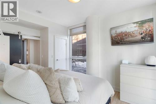 303, 550 Riverfront Avenue Se, Calgary, AB - Indoor Photo Showing Bedroom