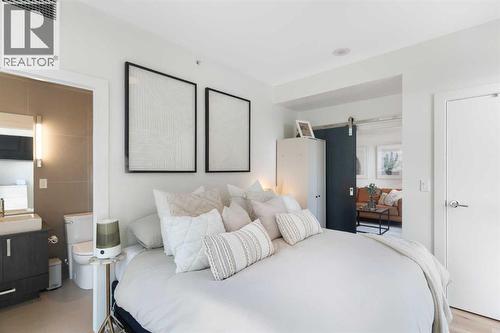 303, 550 Riverfront Avenue Se, Calgary, AB - Indoor Photo Showing Bedroom