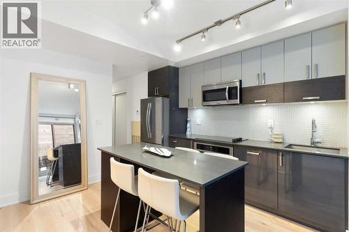 303, 550 Riverfront Avenue Se, Calgary, AB - Indoor Photo Showing Kitchen With Upgraded Kitchen