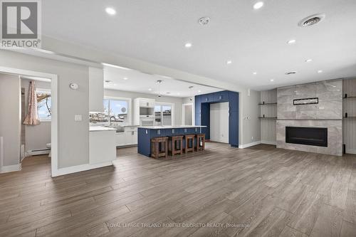 9755 Longwoods Road, Middlesex Centre, ON - Indoor Photo Showing Other Room With Fireplace