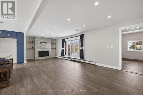9755 Longwoods Road, Middlesex Centre, ON - Indoor Photo Showing Living Room With Fireplace