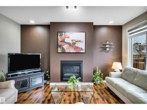 5512 Allbright Sq Sw, Edmonton, AB - Indoor Photo Showing Living Room With Fireplace