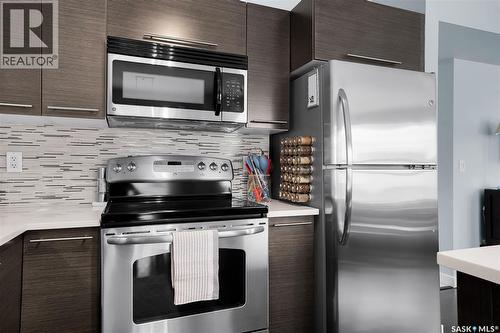318 410 Ledingham Way, Saskatoon, SK - Indoor Photo Showing Kitchen With Stainless Steel Kitchen With Upgraded Kitchen