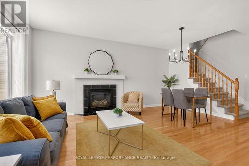 Freshly painted and ready for you! - 1910 Schroeder Crescent, Ottawa, ON - Indoor Photo Showing Living Room With Fireplace