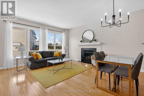 Many new light fixtures in 2025! - 1910 Schroeder Crescent, Ottawa, ON - Indoor With Fireplace