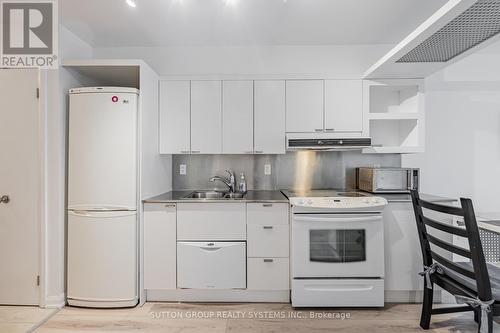 735 - 111 Elizabeth Street, Toronto, ON - Indoor Photo Showing Kitchen With Double Sink