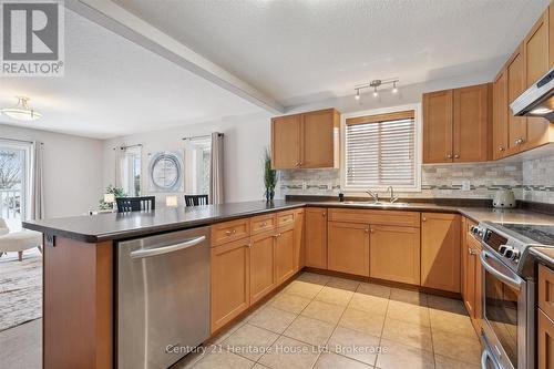 65 Norton Drive, Guelph (Grange Road), ON - Indoor Photo Showing Kitchen With Double Sink