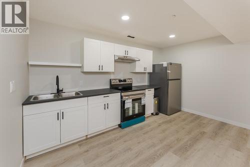 2988 Andres Road, Prince George, BC - Indoor Photo Showing Kitchen With Double Sink