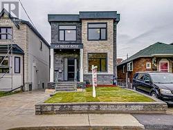 64 FAIRSIDE AVENUE  Toronto, ON M4C 3H2