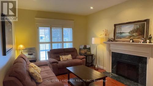 136 Worth Boulevard, Vaughan, ON - Indoor Photo Showing Living Room With Fireplace
