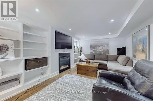 Lower - Living - 333 Rannie Road, Newmarket, ON - Indoor Photo Showing Living Room With Fireplace