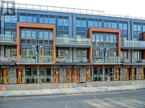 151 - 67 Curlew Drive, Toronto, ON - Outdoor With Balcony With Facade
