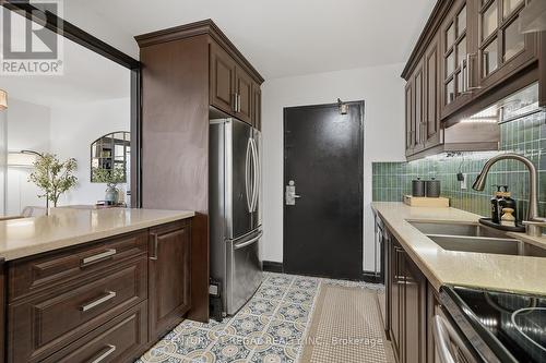 219 - 50 Mississauga Valley Boulevard, Mississauga, ON - Indoor Photo Showing Kitchen With Double Sink