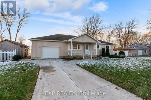 Peaceful dead end street along the river. - 8459 Lazy Lane, Lambton Shores, ON - Outdoor With Facade