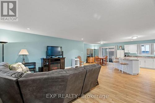 Open concept throughout the living room & kitchen. - 8459 Lazy Lane, Lambton Shores, ON - Indoor Photo Showing Living Room