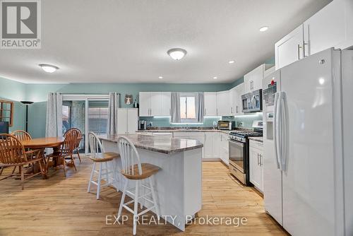 Lots of cupboard space and beautiful Island. - 8459 Lazy Lane, Lambton Shores, ON - Indoor