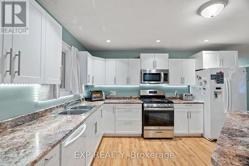 8459 Lazy Lane, Lambton Shores, ON - Indoor Photo Showing Kitchen With Double Sink