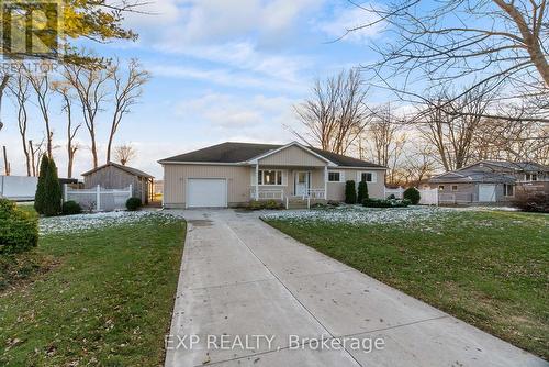 Single paved laneway nice curb appeal. - 8459 Lazy Lane, Lambton Shores, ON - Outdoor With Facade