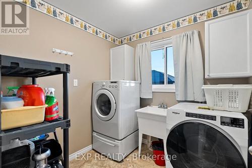 Laundry room behind the kitchen. - 8459 Lazy Lane, Lambton Shores, ON - Indoor Photo Showing Laundry Room
