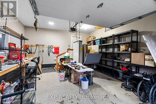 Oversized 1.5 car garage lots of room for storage. - 8459 Lazy Lane, Lambton Shores, ON - Indoor Photo Showing Garage