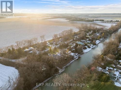 After supper take a kayak on river to see sunset. - 8459 Lazy Lane, Lambton Shores, ON - Outdoor With Body Of Water With View