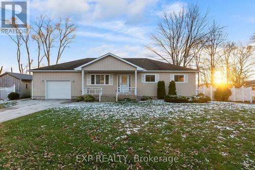 Beautiful area to catch clear view sunsets! - 8459 Lazy Lane, Lambton Shores, ON - Outdoor With Facade