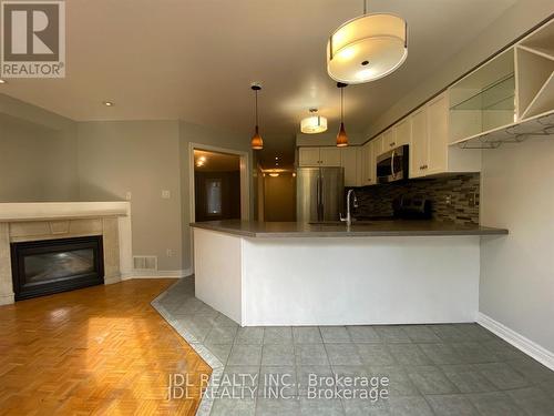 618 Leatherleaf Drive, Mississauga, ON - Indoor With Fireplace