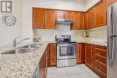 323 - 1077 Gordon Street, Guelph (Kortright West), ON - Indoor Photo Showing Kitchen With Stainless Steel Kitchen With Double Sink