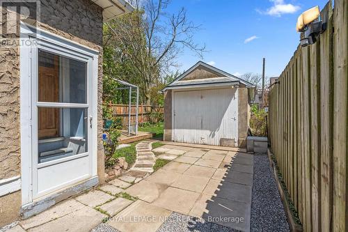 Rear side door to the driveway and garage - 64 Haynes Avenue, St. Catharines (E. Chester), ON - Outdoor With Deck Patio Veranda