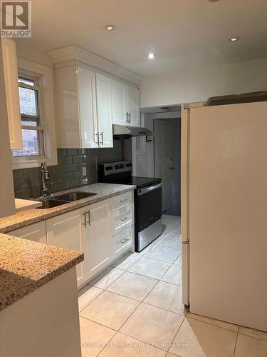 26 Avon Avenue, Toronto, ON - Indoor Photo Showing Kitchen With Double Sink