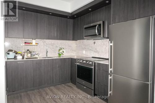 438 - 20 Inn On The Park Drive, Toronto, ON - Indoor Photo Showing Kitchen With Upgraded Kitchen