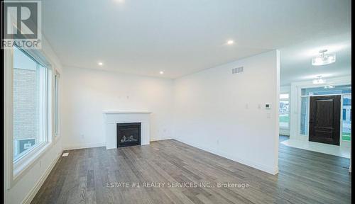 20 Ferris Boulevard W, Zorra, ON - Indoor Photo Showing Living Room With Fireplace