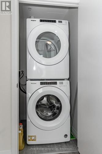 2003 - 60 Charles Street W, Kitchener, ON - Indoor Photo Showing Laundry Room